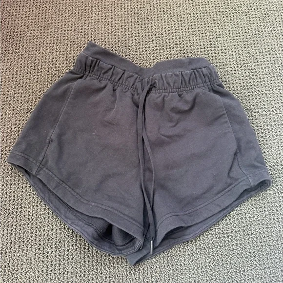 Black lululemon tie up shorts. Super cute! Size 2. - Picture 1 of 3